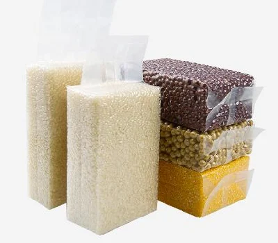Sachets en plastique refermables sous vide en relief par sac sous vide d'emballage de riz en nylon PE